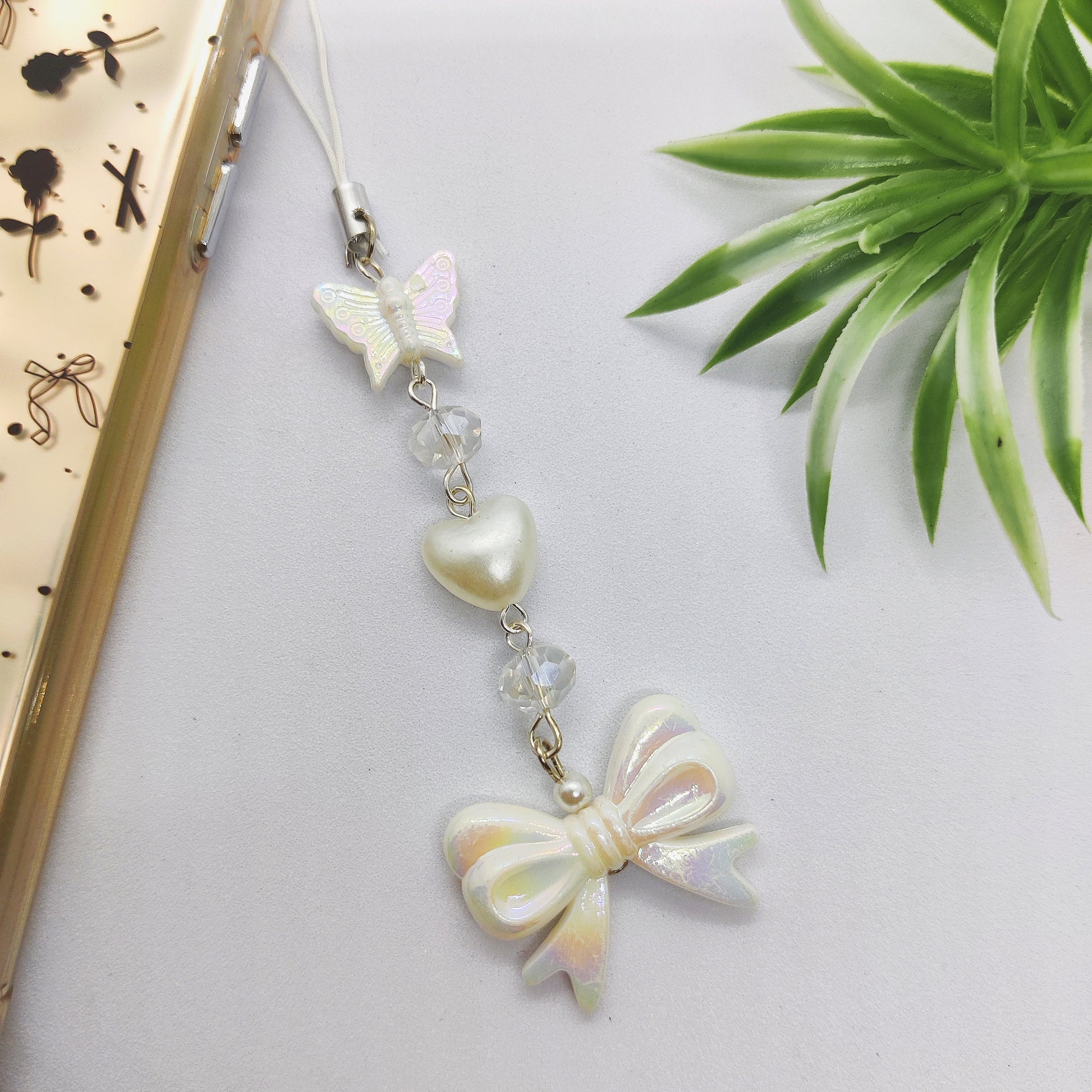 White Whisper Phone Charm