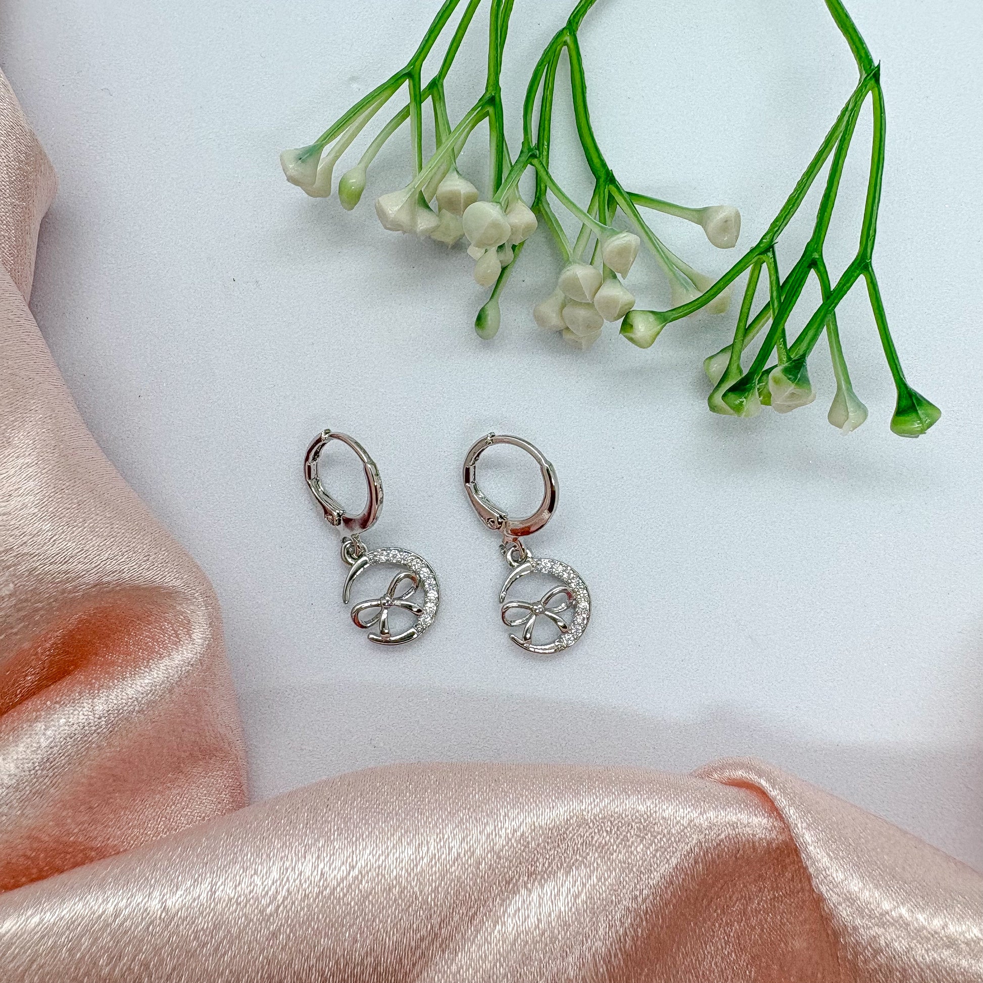Moon and Bow Silver Charm Earrings