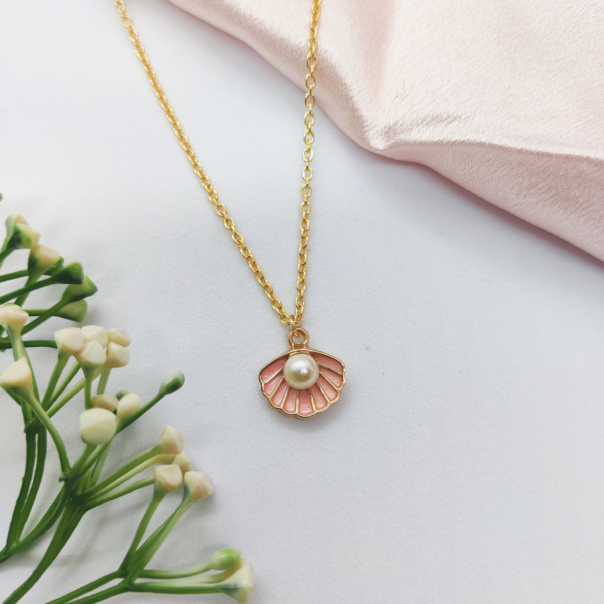 Mermaid’s Treasure Golden Charm Necklace